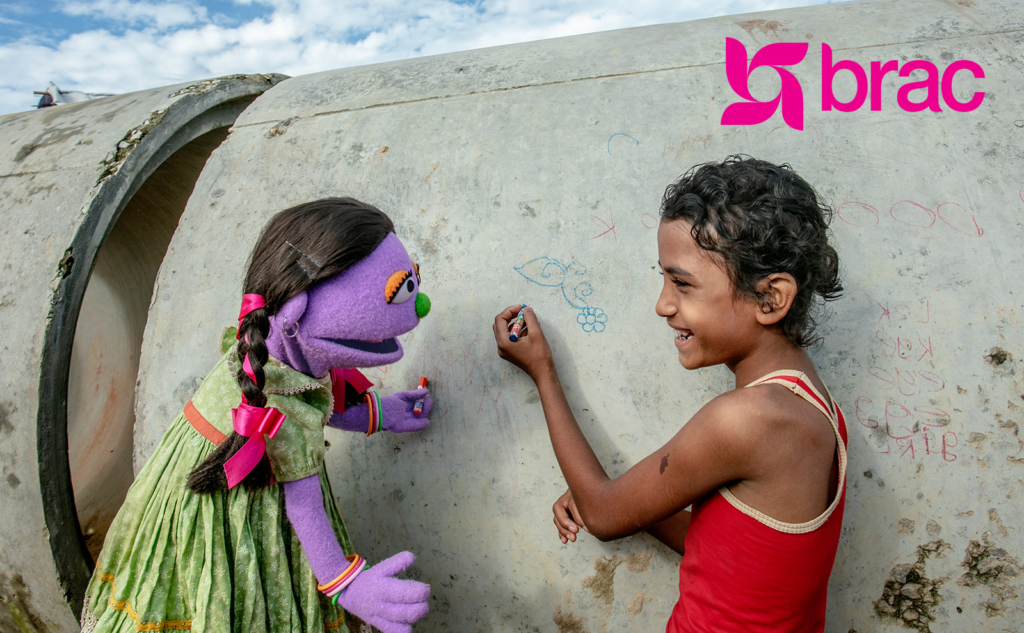 BRAC photo girl with puppet